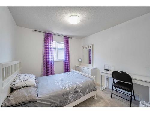 133 Panatella Parade Nw, Calgary, AB - Indoor Photo Showing Bedroom