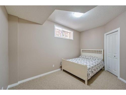 133 Panatella Parade Nw, Calgary, AB - Indoor Photo Showing Bedroom