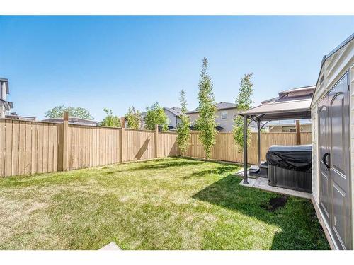 133 Panatella Parade Nw, Calgary, AB - Outdoor With Backyard