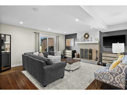 12 Strathcona Road Sw, Calgary, AB - Indoor Photo Showing Living Room With Fireplace