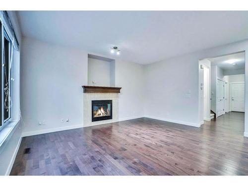 32 Saddlelake Gardens Ne, Calgary, AB - Indoor Photo Showing Living Room With Fireplace