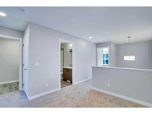 954 Cobblemore Common Sw, Airdrie, AB - Indoor Photo Showing Other Room