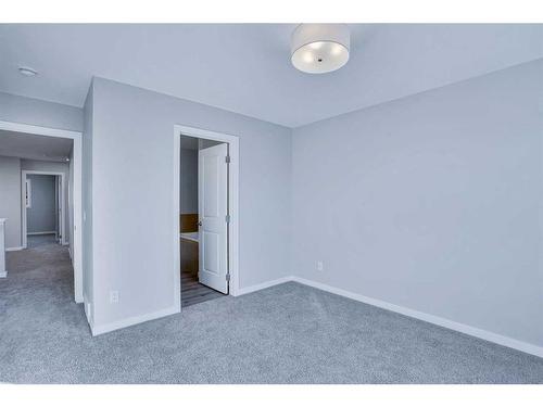 954 Cobblemore Common Sw, Airdrie, AB - Indoor Photo Showing Other Room