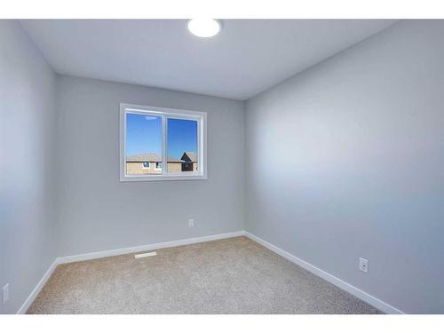 954 Cobblemore Common Sw, Airdrie, AB - Indoor Photo Showing Other Room