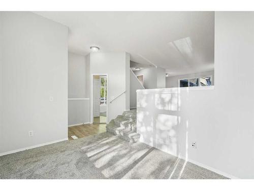 348 Mckenzie Towne Link Se, Calgary, AB - Indoor Photo Showing Other Room