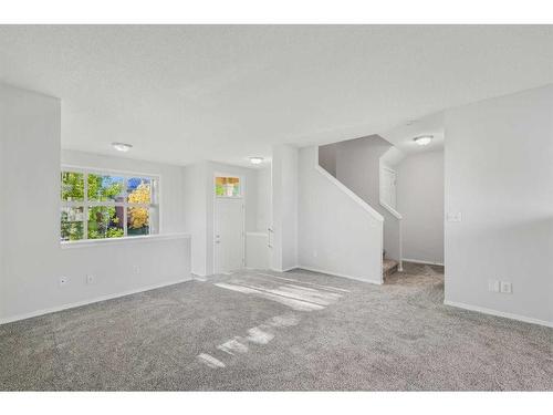 348 Mckenzie Towne Link Se, Calgary, AB - Indoor Photo Showing Other Room