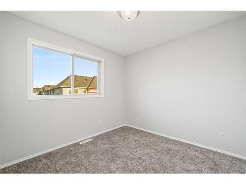 348 Mckenzie Towne Link Se, Calgary, AB - Indoor Photo Showing Other Room