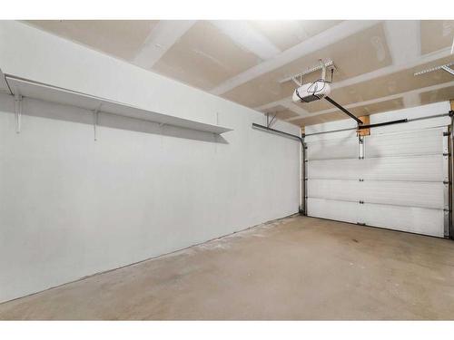 348 Mckenzie Towne Link Se, Calgary, AB - Indoor Photo Showing Garage