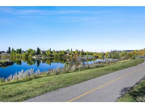 348 Mckenzie Towne Link Se, Calgary, AB - Outdoor With Body Of Water With View