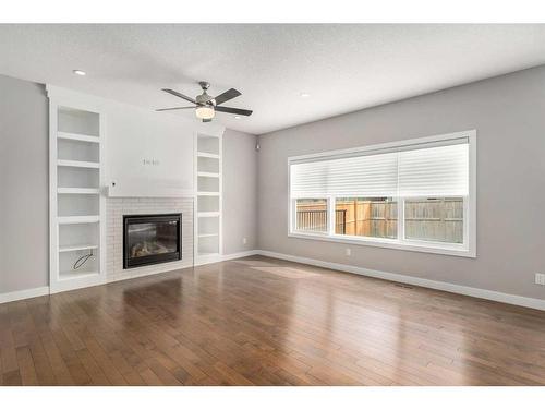 159 Sherview Grove Nw, Calgary, AB - Indoor Photo Showing Living Room With Fireplace