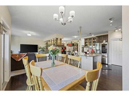 56 Jumping Pound Rise, Cochrane, AB - Indoor Photo Showing Dining Room