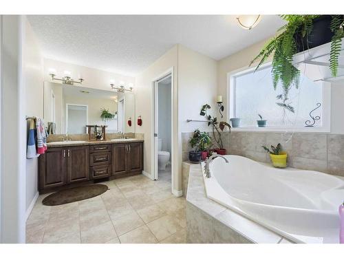 56 Jumping Pound Rise, Cochrane, AB - Indoor Photo Showing Bathroom