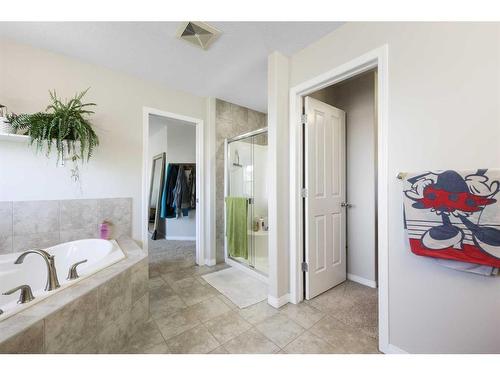 56 Jumping Pound Rise, Cochrane, AB - Indoor Photo Showing Bathroom