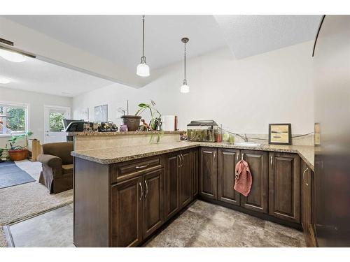 56 Jumping Pound Rise, Cochrane, AB - Indoor Photo Showing Kitchen