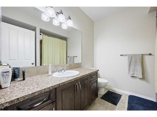 56 Jumping Pound Rise, Cochrane, AB - Indoor Photo Showing Bathroom