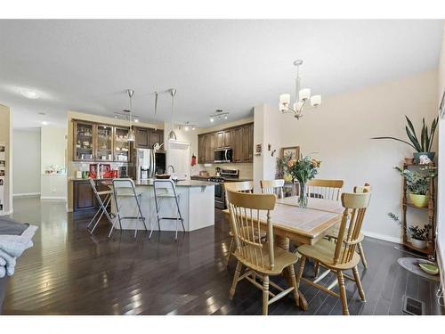 56 Jumping Pound Rise, Cochrane, AB - Indoor Photo Showing Dining Room