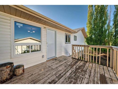 34 West Boothby Crescent, Cochrane, AB - Outdoor With Deck Patio Veranda With Exterior