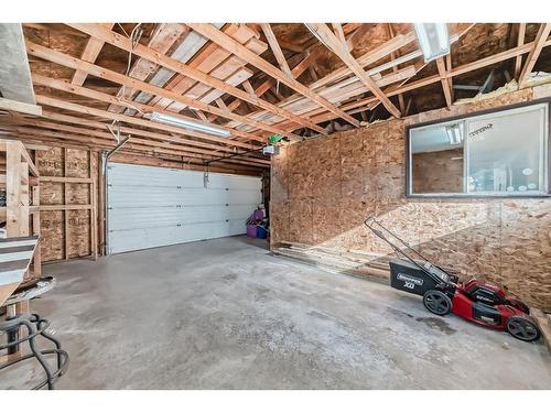 34 West Boothby Crescent, Cochrane, AB - Indoor Photo Showing Garage