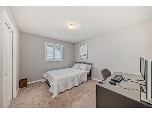 52 Brightoncrest Rise Se, Calgary, AB - Indoor Photo Showing Bedroom