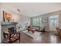 52 Brightoncrest Rise Se, Calgary, AB  - Indoor Photo Showing Living Room With Fireplace 