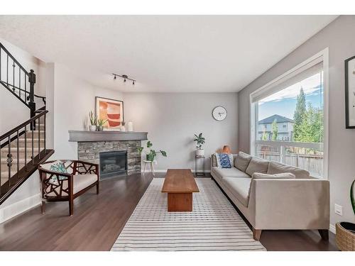 52 Brightoncrest Rise Se, Calgary, AB - Indoor Photo Showing Living Room With Fireplace