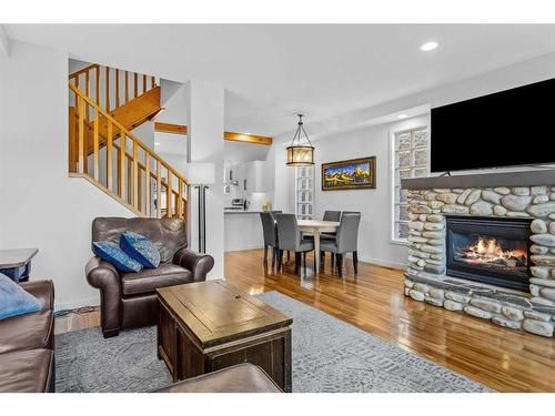 3-813 6Th Street, Canmore, AB - Indoor Photo Showing Living Room With Fireplace