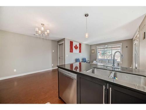 1106-155 Skyview Ranch Way Ne, Calgary, AB - Indoor Photo Showing Kitchen With Double Sink