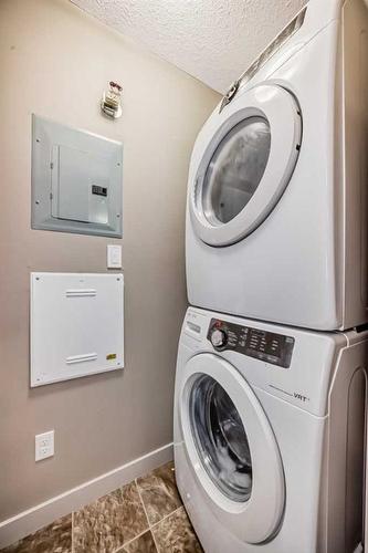 1106-155 Skyview Ranch Way Ne, Calgary, AB - Indoor Photo Showing Laundry Room