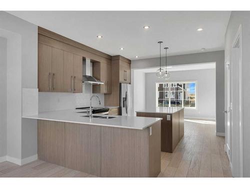 600 Dawson Drive, Chestermere, AB - Indoor Photo Showing Kitchen With Double Sink With Upgraded Kitchen