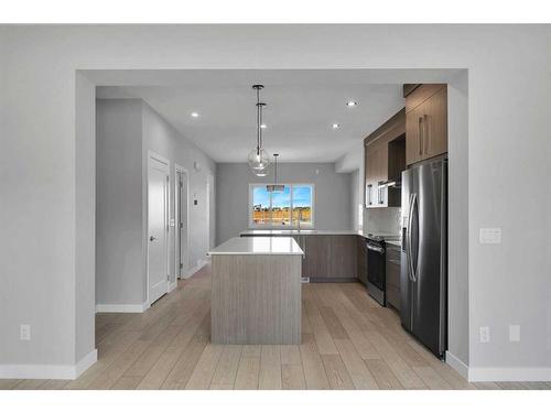 600 Dawson Drive, Chestermere, AB - Indoor Photo Showing Kitchen With Stainless Steel Kitchen