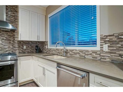 182 Mahogany Passage Se, Calgary, AB - Indoor Photo Showing Kitchen With Double Sink