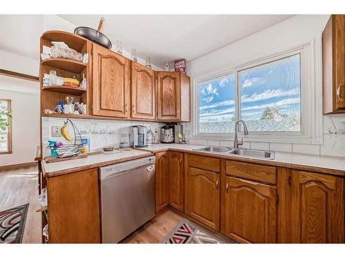 27 Rundleson Way Ne, Calgary, AB - Indoor Photo Showing Kitchen With Double Sink