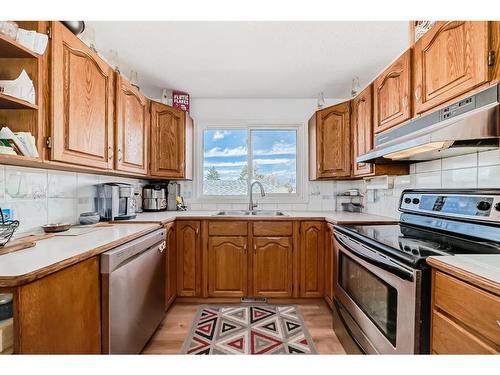 27 Rundleson Way Ne, Calgary, AB - Indoor Photo Showing Kitchen With Double Sink