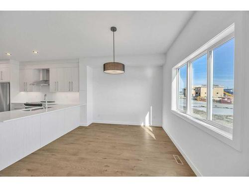 604 Dawson Drive, Chestermere, AB - Indoor Photo Showing Kitchen With Double Sink