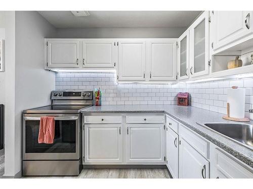 1404-13104 Elbow Drive Sw, Calgary, AB - Indoor Photo Showing Kitchen