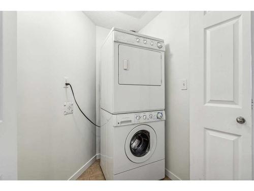 1402-325 3 Street Se, Calgary, AB - Indoor Photo Showing Laundry Room