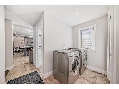 7 Berkshire Road Nw, Calgary, AB - Indoor Photo Showing Laundry Room