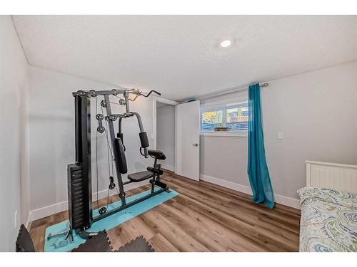 7 Berkshire Road Nw, Calgary, AB - Indoor Photo Showing Gym Room