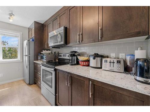 618 Cranford Mews Se, Calgary, AB - Indoor Photo Showing Kitchen