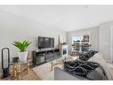 618 Cranford Mews Se, Calgary, AB  - Indoor Photo Showing Living Room 