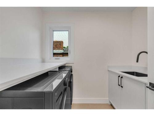 511 Wilderness Drive Se, Calgary, AB - Indoor Photo Showing Laundry Room