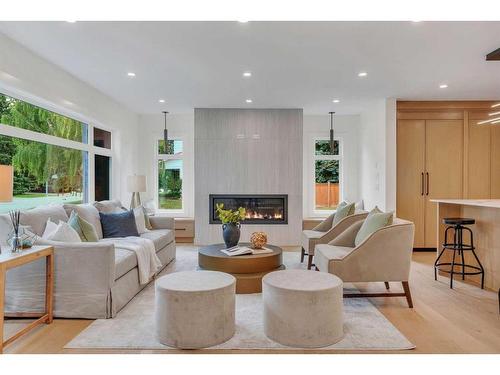 511 Wilderness Drive Se, Calgary, AB - Indoor Photo Showing Living Room With Fireplace