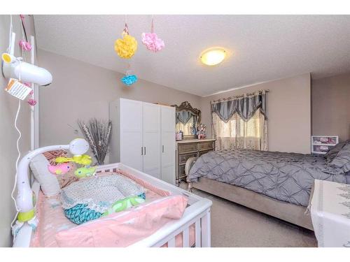 55 Redstone Boulevard Ne, Calgary, AB - Indoor Photo Showing Bedroom