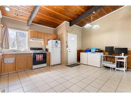 107 Pinemont Bay Ne, Calgary, AB - Indoor Photo Showing Kitchen With Double Sink