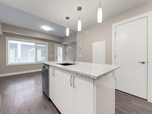 104-20 Brentwood Common Nw, Calgary, AB - Indoor Photo Showing Kitchen With Upgraded Kitchen