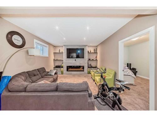 29 Kincora Street Nw, Calgary, AB - Indoor Photo Showing Living Room With Fireplace