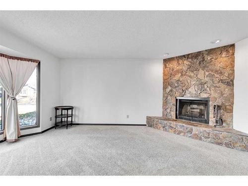 2409 146 Avenue Se, Calgary, AB - Indoor With Fireplace