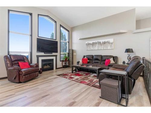 80 Cambrille Crescent, Strathmore, AB - Indoor Photo Showing Living Room With Fireplace