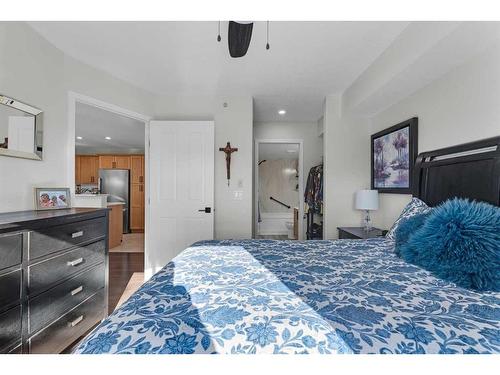 301-390 Marina Drive, Chestermere, AB - Indoor Photo Showing Bedroom