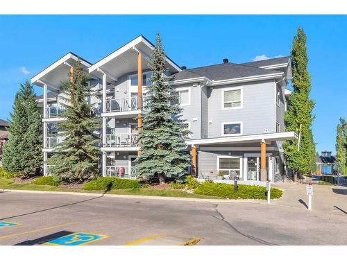 301-390 Marina Drive, Chestermere, AB - Outdoor With Facade